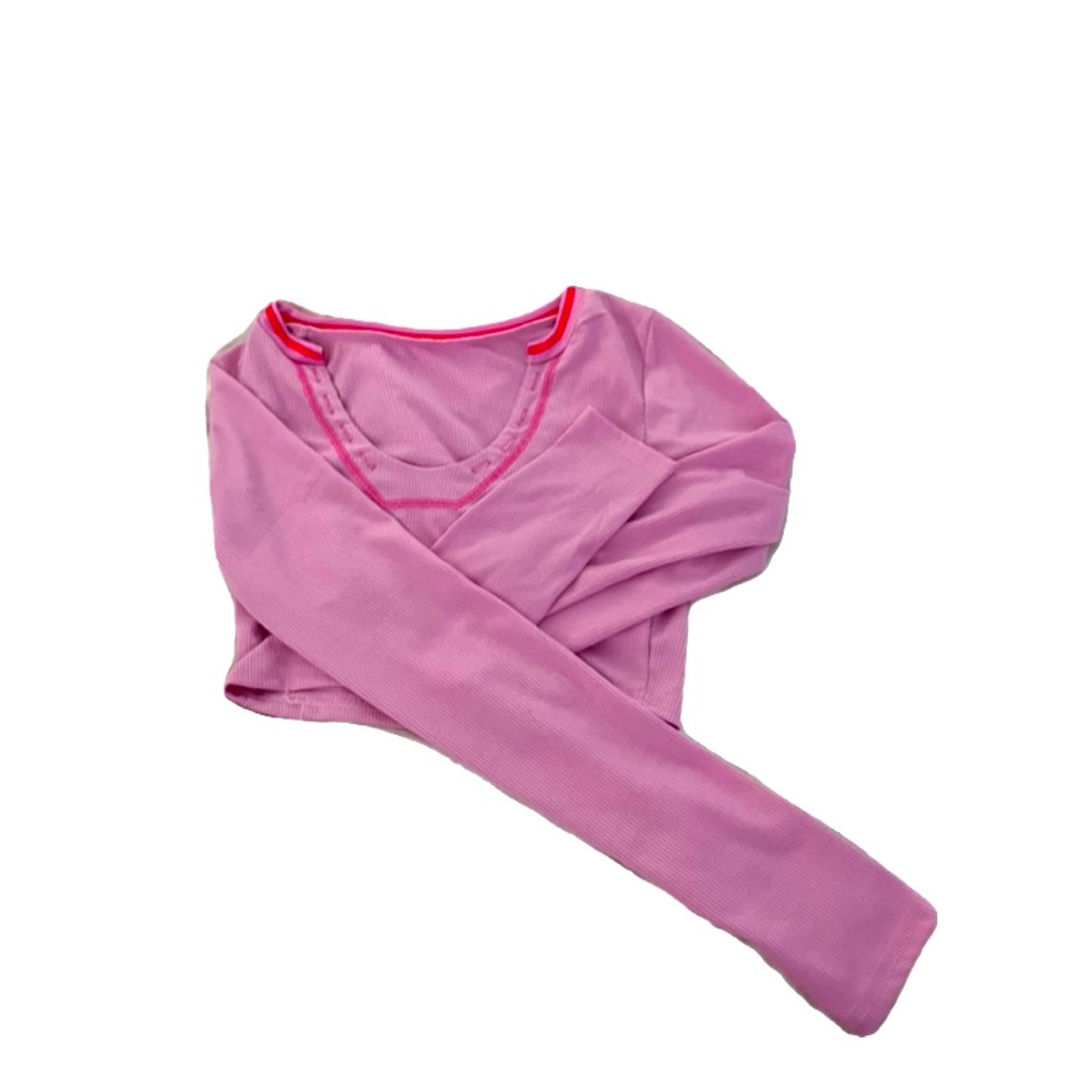 Pink low cut crop top.
